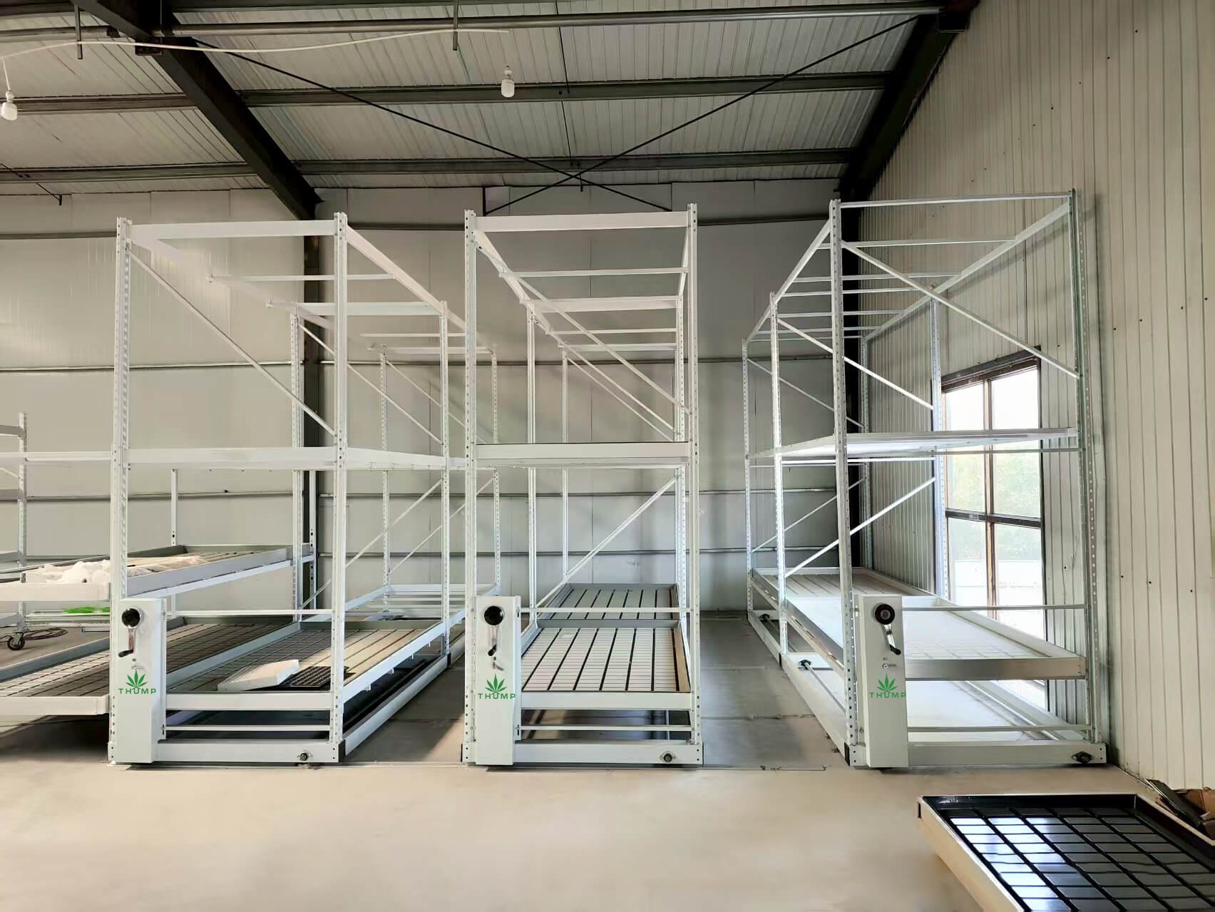 Thump supplies high quality vertical grow rack system for indoor cannabis farming vertical grow rack